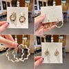 Brand retro fashionable earrings, European style, simple and elegant design, bright catchy style