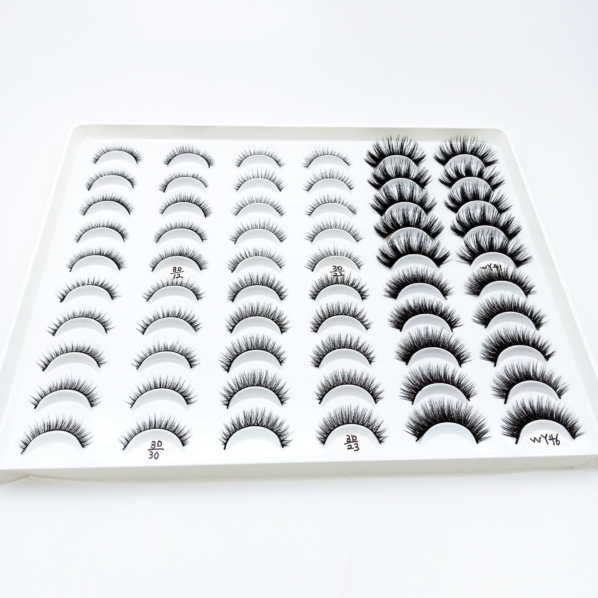 Venta al por mayor de fábrica tridimensional Cruz multi-capa de pestañas ojos grandes europeos y americanos 30 pares mezclados rizado pestañas postizas