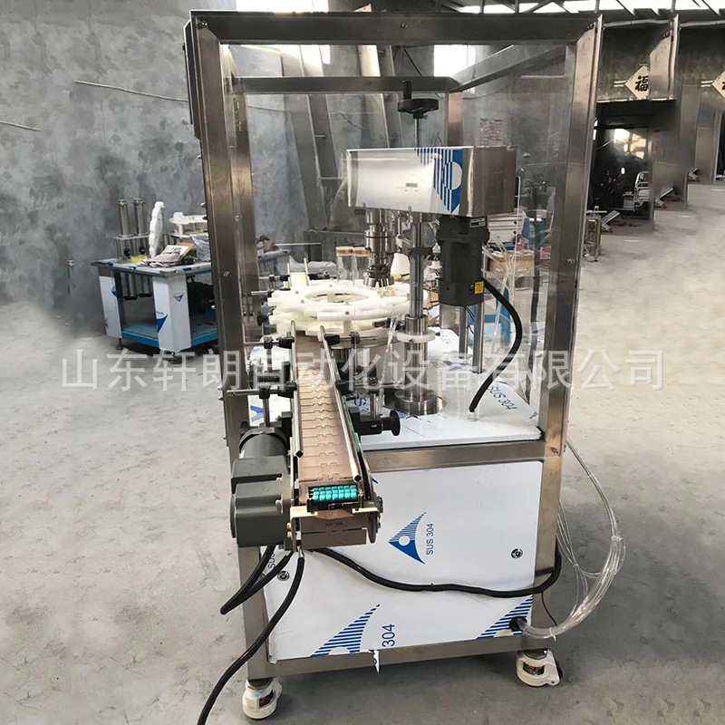 铁罐塑料瓶封盖机 全自动日化塑料瓶锁盖机 颗粒固体圆形瓶封口机