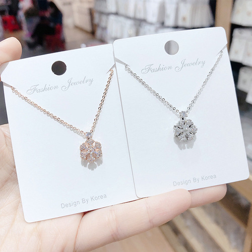 Xiaohongshu's same style rotatable snowflake necklace Austrian crystal snowflake pendant women's clavicle chain necklace wholesale