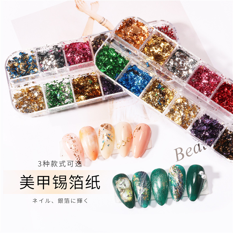 Joyería de hoja de color de uñas de Venta caliente transfronteriza 12 caja de tira de rejilla uñas papel de estaño roto hoja de oro de doble cara hoja de plata joyería