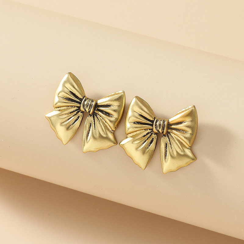 Retro Distressed Metal Bow  Korean Fashion Simple  Earrings display picture 3