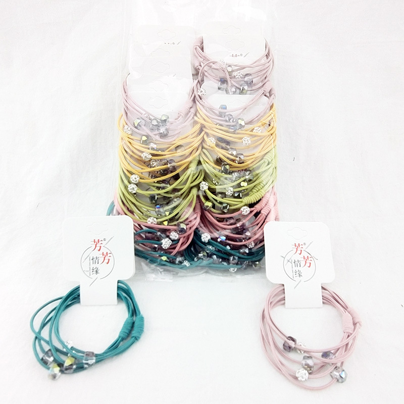 A3125 más de cristal accesorios banda de goma banda de pelo cuerda de pelo tocado 2 yuanes tienda de distribución al por mayor