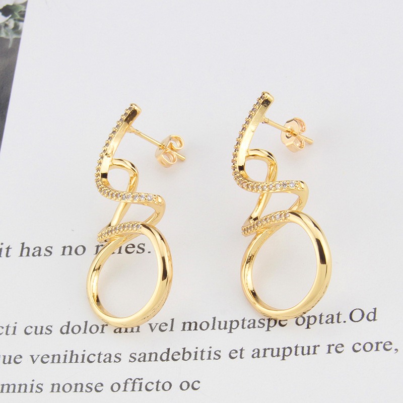 Simple Gold-plated Zircon Winding Earrings display picture 7