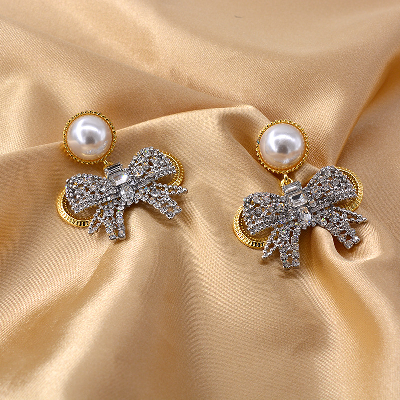 New Baroque Flash Diamond Elegant Pearl Bow 925 Silver Pin Earrings Wholesale display picture 2