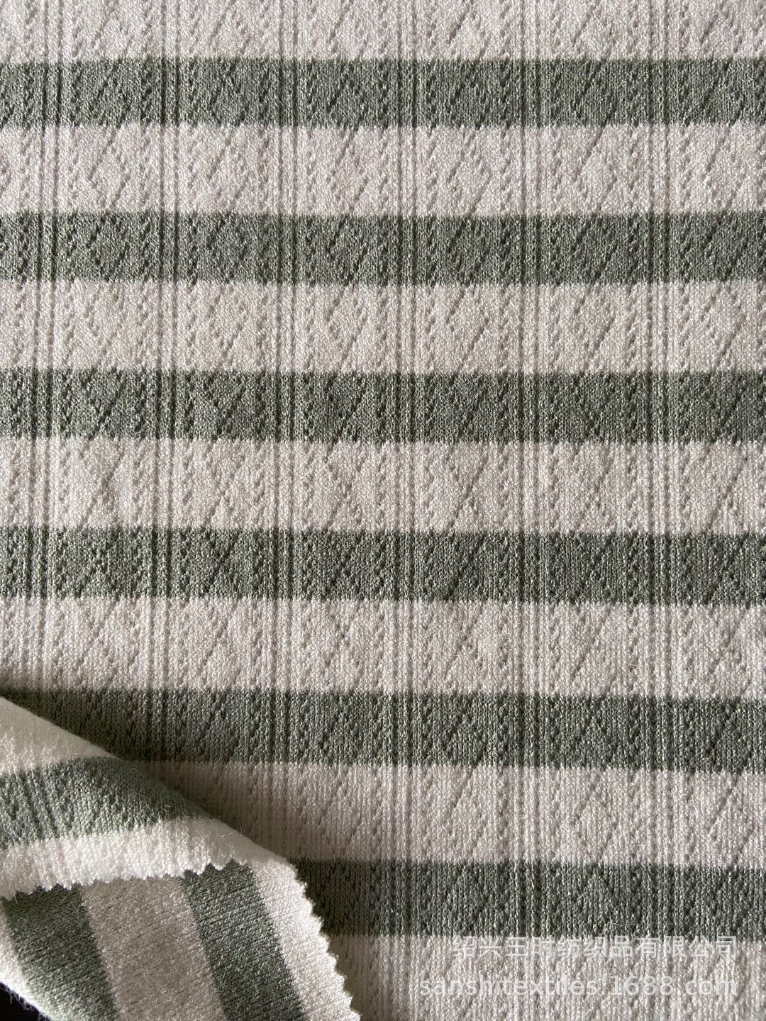 新品热销 针织粗针移圈提花罗纹面料 仿羊绒提花色织条毛衣毛衫