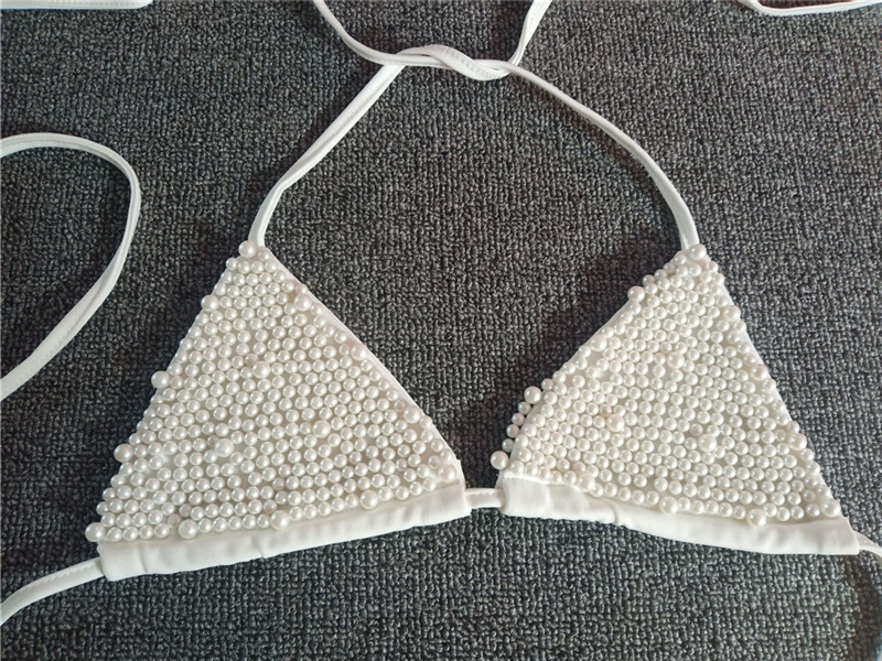 Bikini sexy de perlas con costuras en la playa NSXYA39810