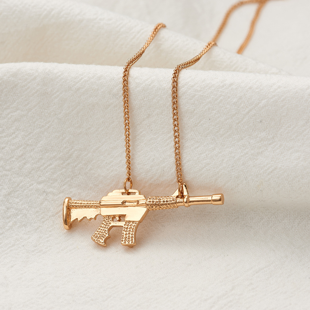 copper pendant machine gun necklace