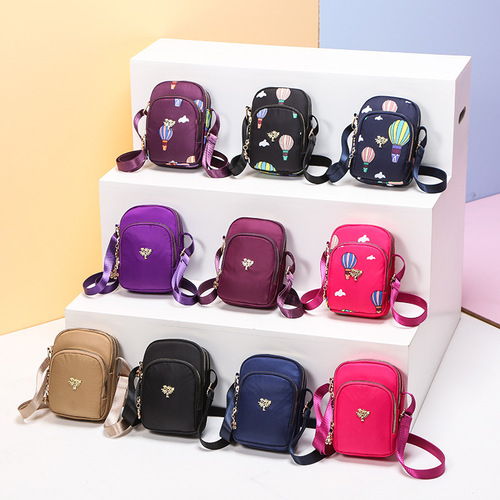 New mobile phone bag for women crossbody 2020 Internet celebrity Korean version lightweight mini bag shoulder cloth bag vertical coin purse