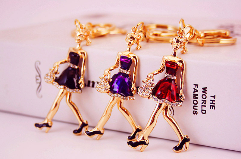 28g Weight Alloy, Metal Material Doll Pattern Unisex Gender Purple, Red, Black Color Little Girl Pendant Keychain 1