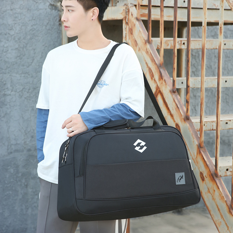 Moda simple gran capacidad bolsa de fitness 2020 nuevo estilo coreano de moda impermeable resistente al desgaste de nylon bolsa de deportes fábrica al por mayor