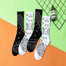 韩国INS潮牌满身爱心中筒全棉黑白男女潮流运动欧美情侣滑板袜子