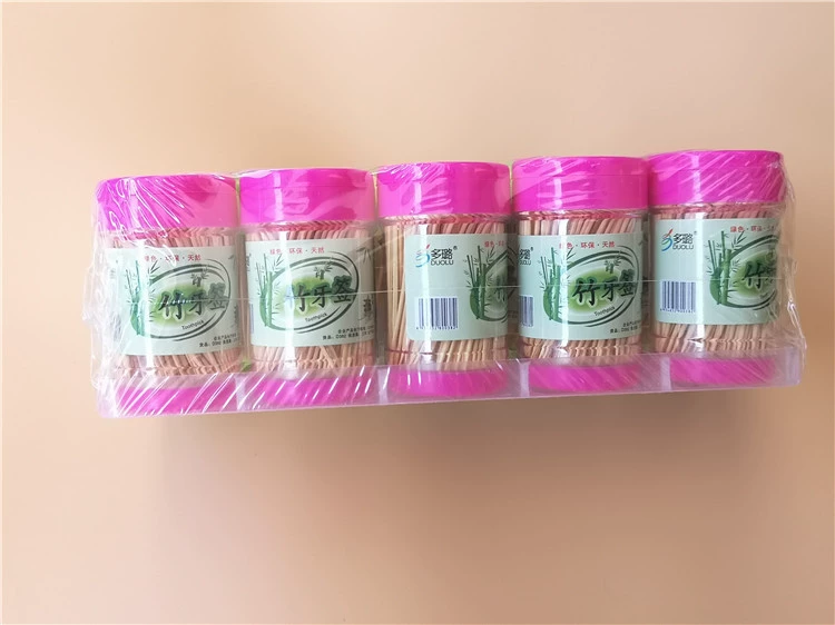 Уличная палатка продаёт зубочистки по 2 юаня бутылочки с зубочистками