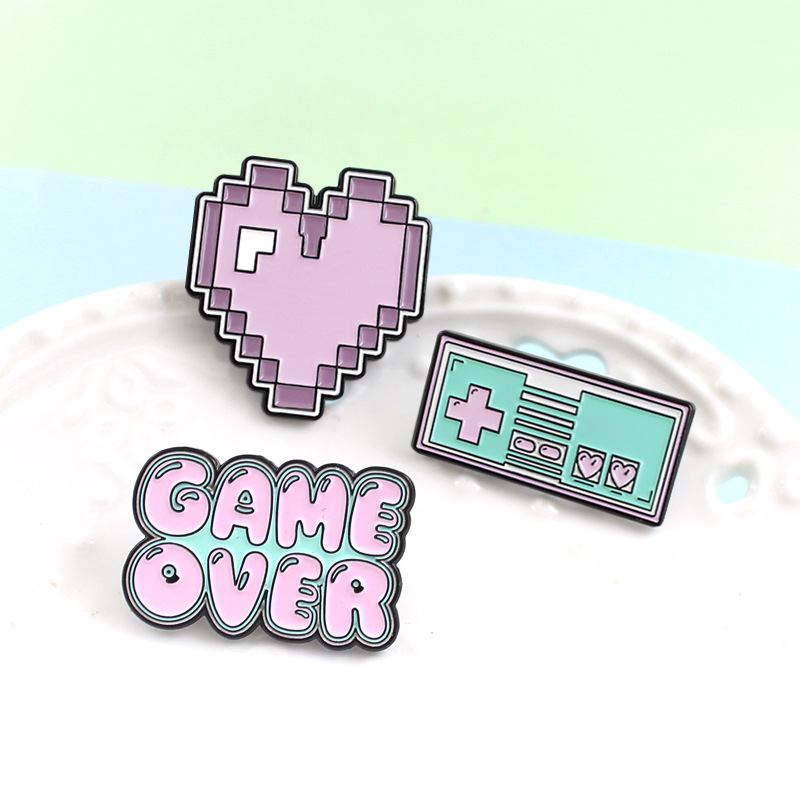 Cartoon game console, handle, fashionable brooch, universal badge