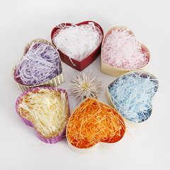 Factory wholesale shredded paper strips, candy gift boxes, and raffia-filled gift boxes—standard paper strips available in 1KG packs, with multiple color options.