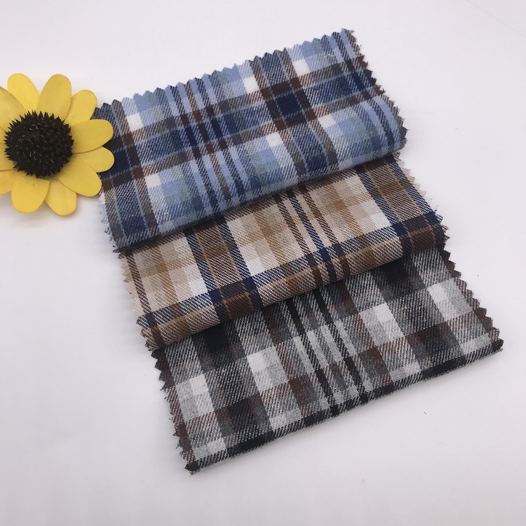 厂家直销 新品21支涤棉磨毛色织格 人字纹衬衫家居服口袋面料现货