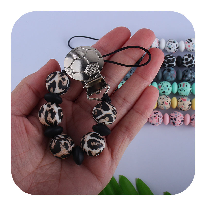 Nuevo bebé hierro fútbol chupete clip bebé creativo calmante leopardo impresión silicona cuentas mordedor chupete cadena anti-gota cadena