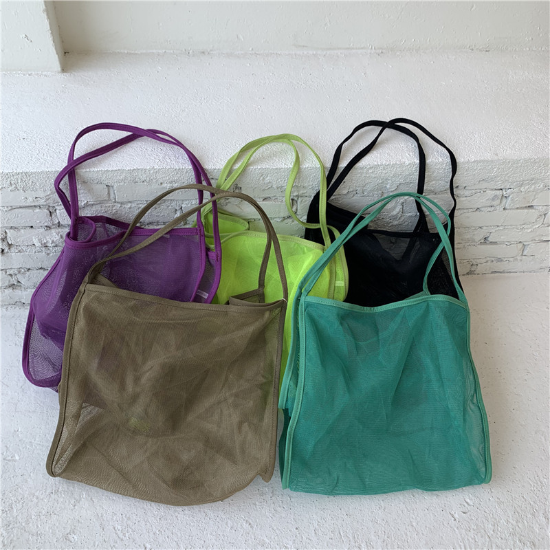 Capacious shoulder bag