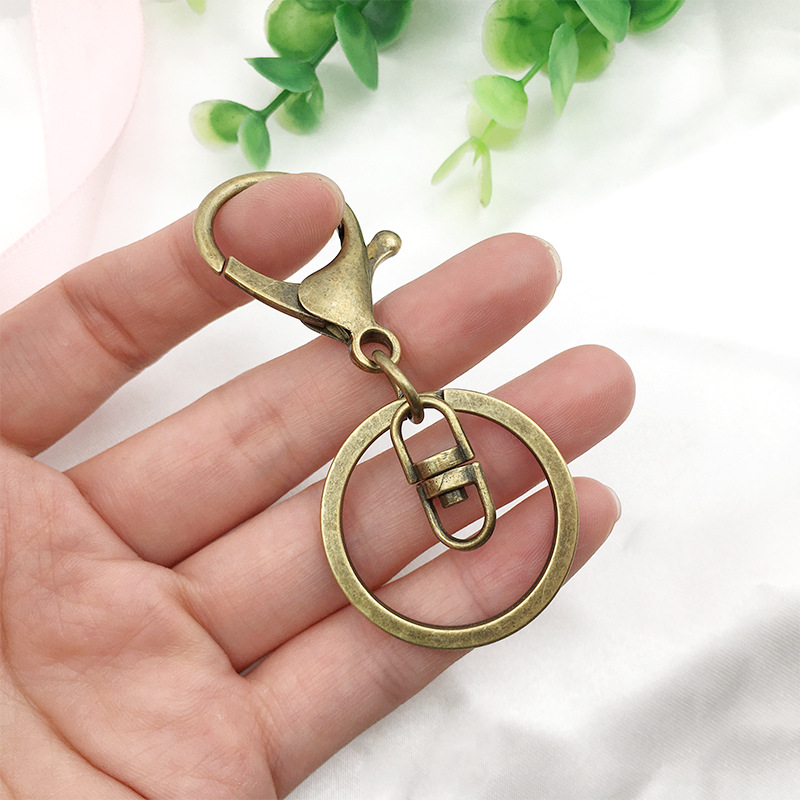 Wholesale Keychain Ring Chain Metal Pendant Snap Hook Door Latch Lobster Buckle Three-Piece Set Color Retention Plated Diy Ornament Accessories display picture 3