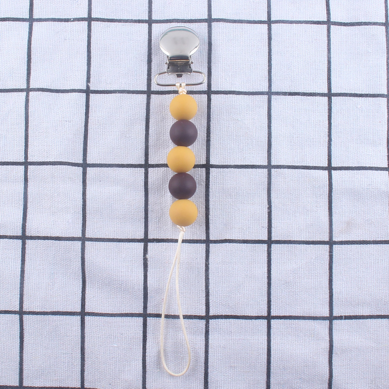 Cadena de pezón de silicona calmante Nuevo clip de hierro clip de pezón Dispositivo de molienda de dientes de bebé cadena anti-caída cadena anti-perdida