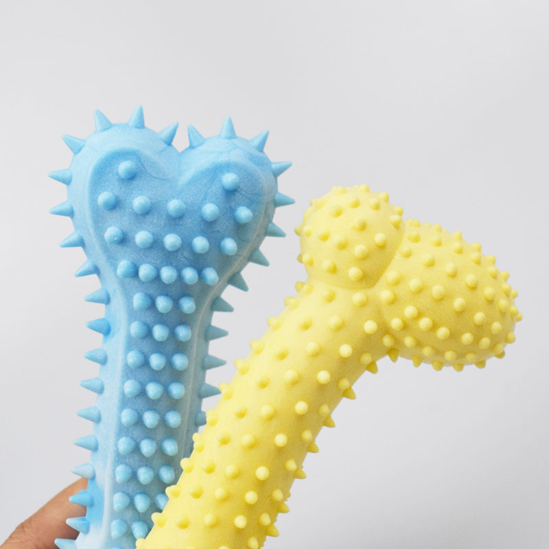 Nuevo color perro molar Limpieza de dientes juguete TPR leche sabor espuma hueso mascota Bola de juguete fábrica al por mayor