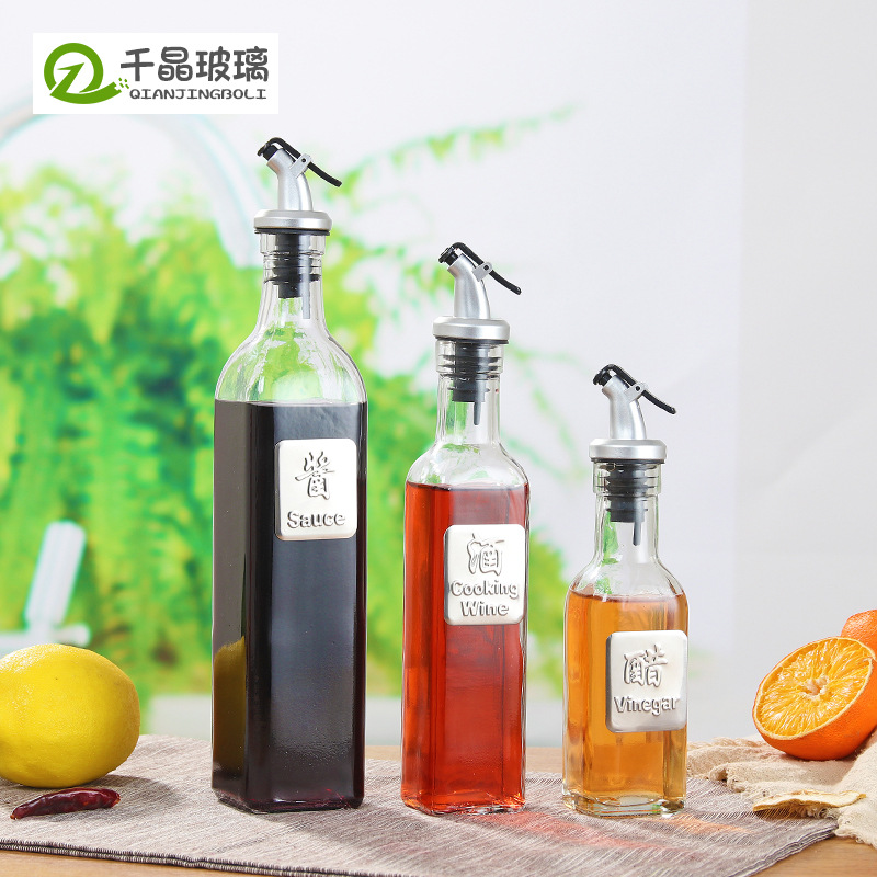 Fábrica al por mayor cocina botella de aceite de vidrio 300ml aceite de oliva olla boquilla de aceite 500ml salsa de soja vinagre tarro hogar