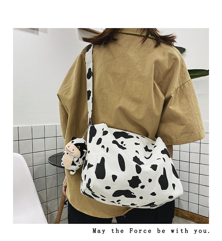 Korean New Simple Lazy Style Cute Cow Polka Dot Student Canvas Bag Class Bag Wild Messenger Bag Wholesale display picture 43