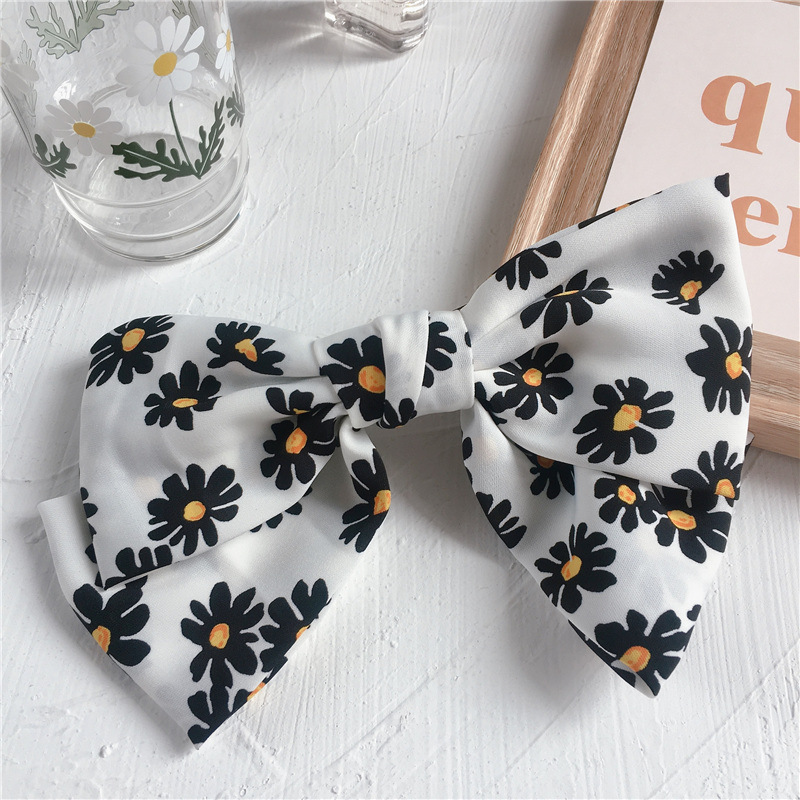 New Fashion Daisy Bow Tie Wild Cheap Scrunchies Wholesale display picture 8