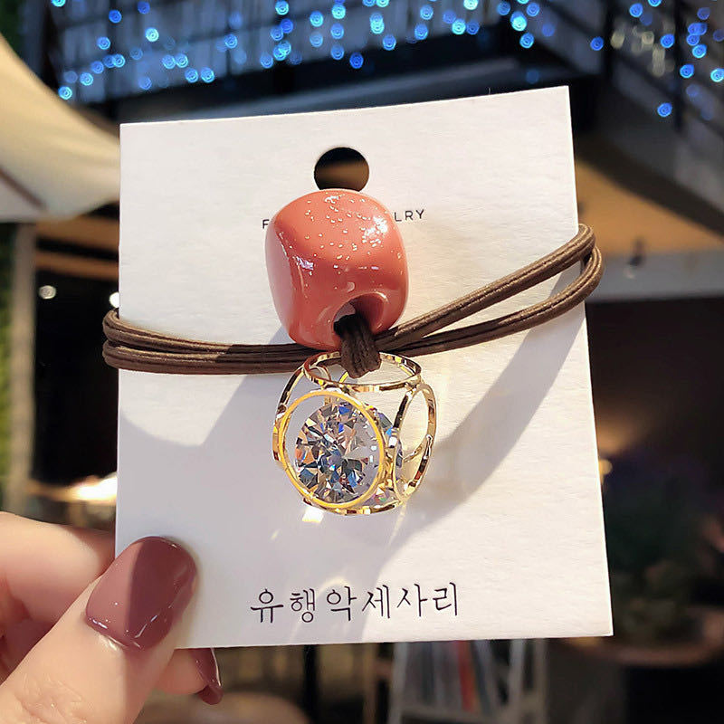 韓国の女性の髪輪ネットの赤い髪飾りの髪飾りの透かし彫りの皮筋の2元の店は髪の毛のひもの高弾力のアクセサリーを刺します。|undefined