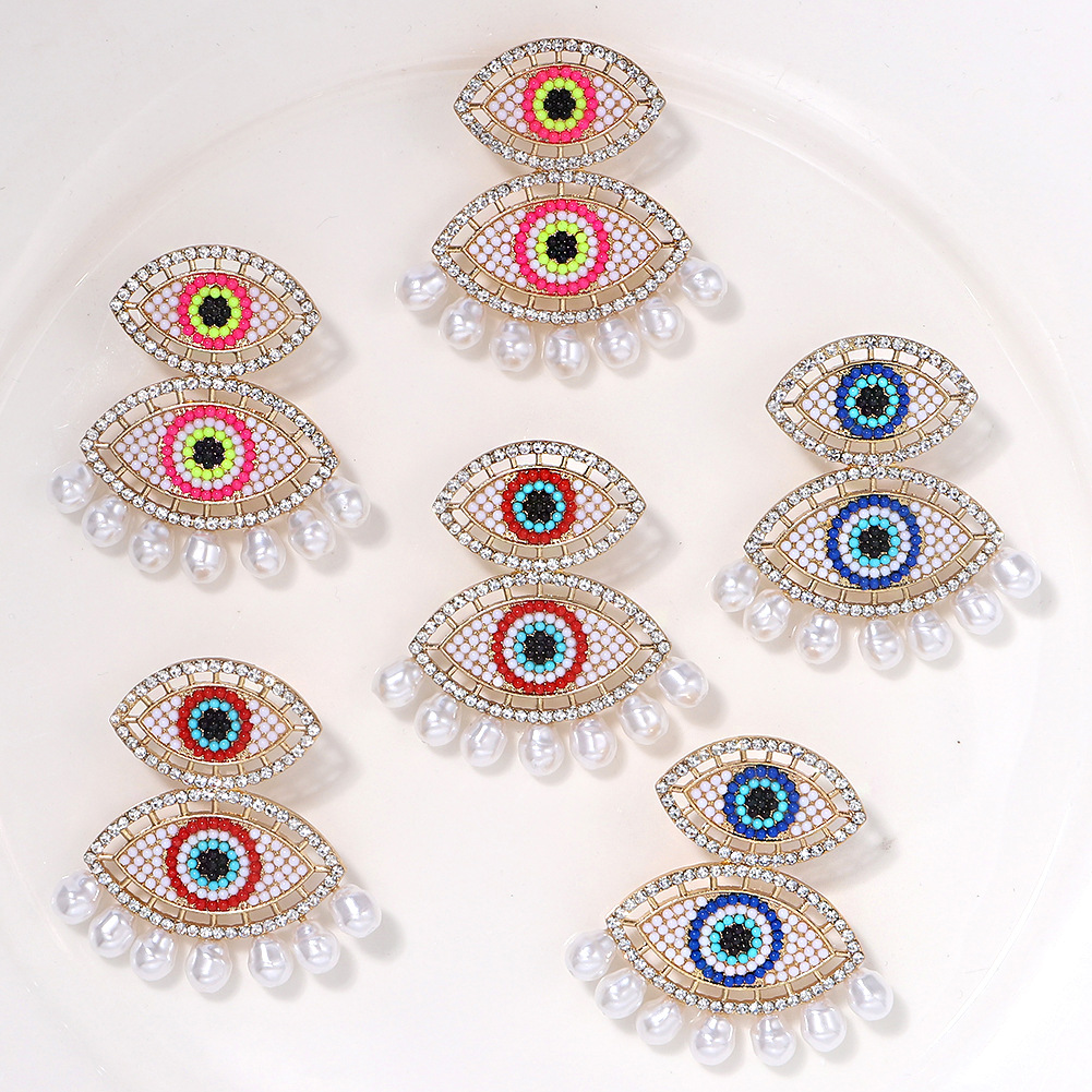 Irregular Geometric Blue Eyes Diamonds Stitching Pearl Tassel Earrings Wholesale display picture 9