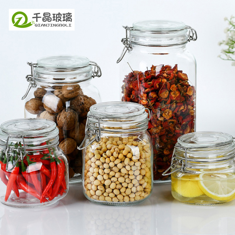 Venta al por mayor redonda de vidrio hebilla sellada frasco cuadrado hogar a prueba de humedad multi-grano almacenamiento botella frasco de almacenamiento enlatado botella en Escabeche