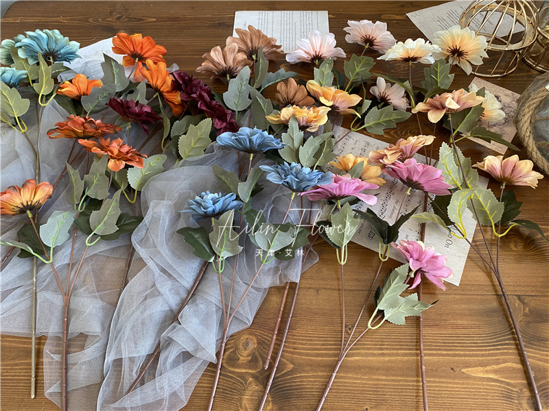3 autumn colorful flowers