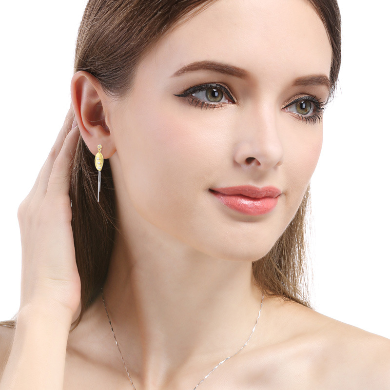 Chapado en oro hoja larga s925 pendientes de plata elegante temperamento Super Hada moda femenina pendientes fuente de fábrica al por mayor