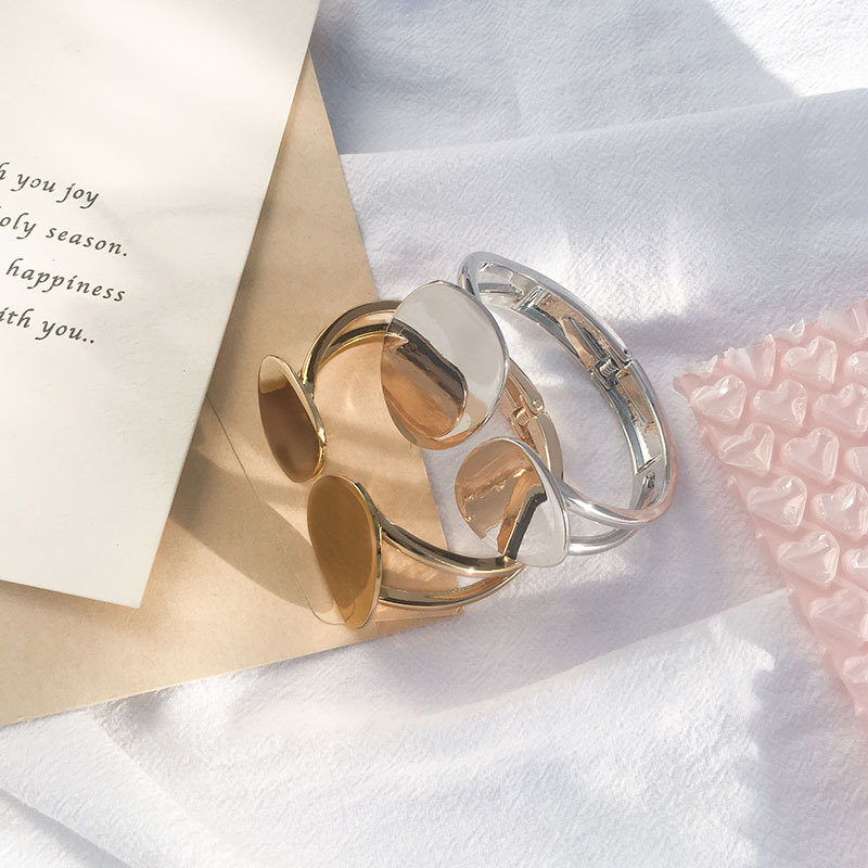 Hollow Asymmetrical Oval Alloy Open Bracelet