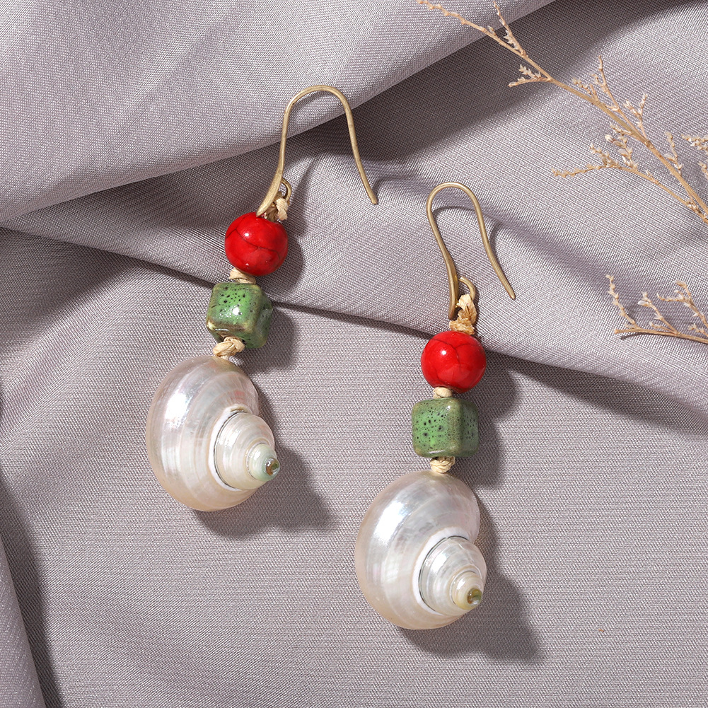 Za Même Produit Sur Site Officiel Conque Pierre Perle Boucles D'oreilles Européen Et Américain Personnalité De La Mode Populaire Vacances Style Boucles D'oreilles display picture 3