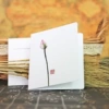 Bud with a small greeting card