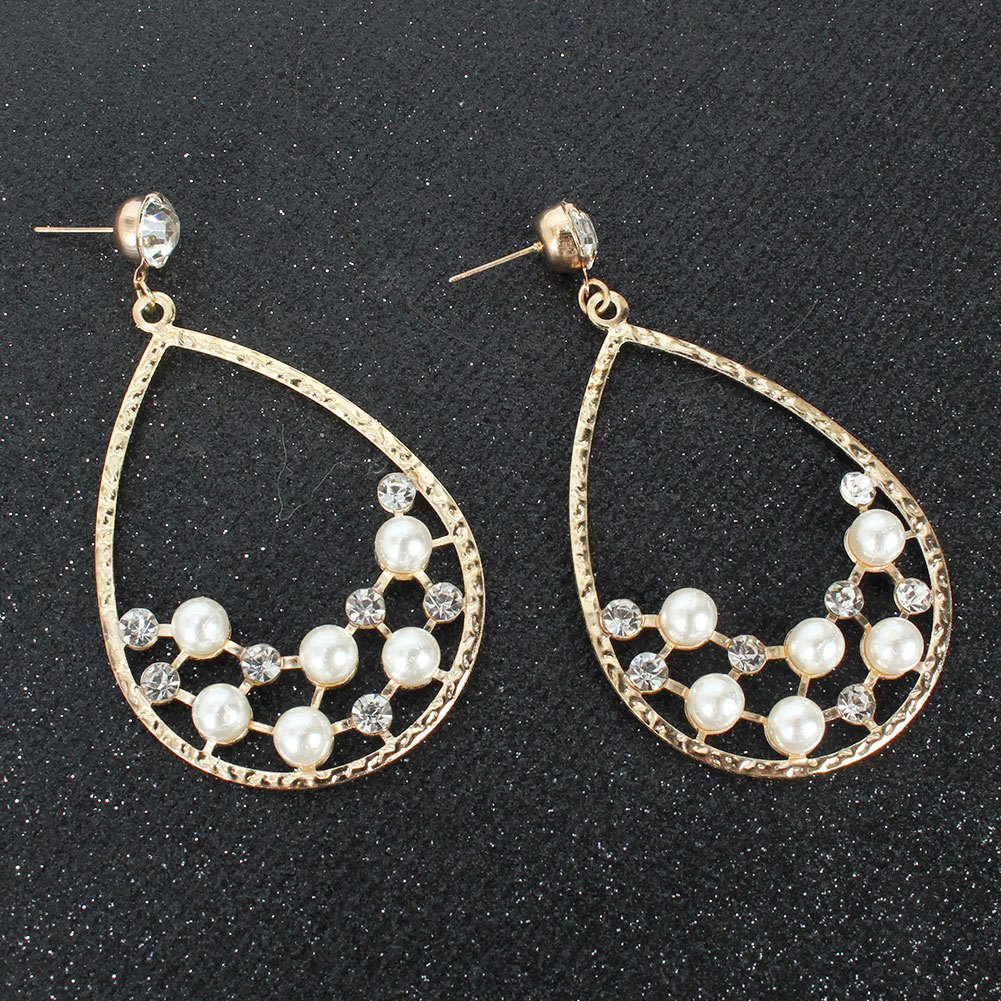 Creative Personality Drop-shaped Alloy Acrylic Diamond-set Pearl Earrings Wholesale Nihaojewelry display picture 2