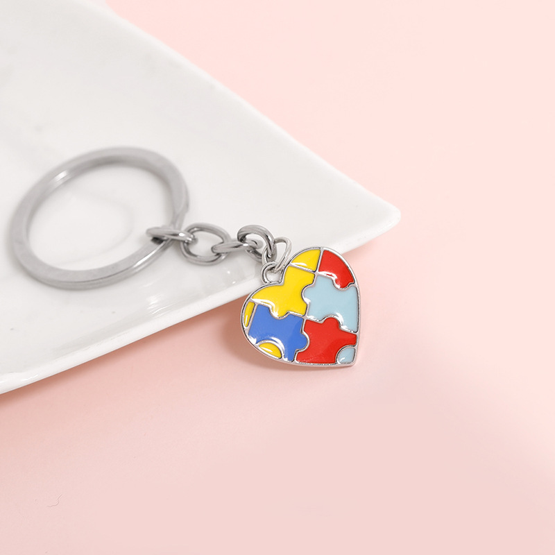 Creative Children's Four-color Puzzle Splicing Color Heart-shaped Cross Keychain Pendant display picture 5