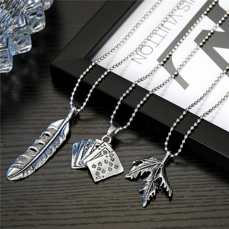 European Creative Personality Vintage Necklace Feather Maple Leaf Playing Card Alloy Large Pendant Necklace Ornament display picture 1