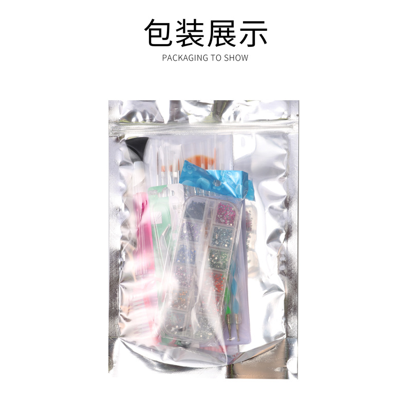 Herramientas de uñas transfronterizas traje de uñas arte pluma Archivo de uñas joyería de acero Punto de empuje taladro pluma manicura traje al por mayor