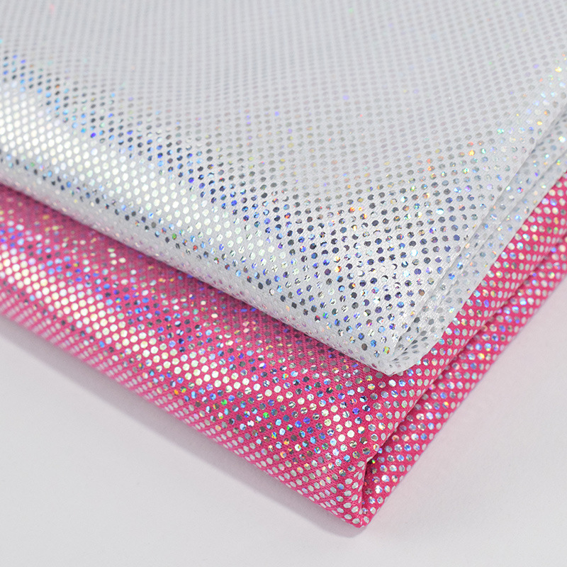 厂家批发镭射幻彩布七彩烫金点子复合无纺布料舞台演出服装饰面料