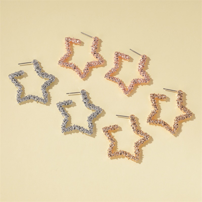 New Earrings Opening Five-pointed Star Earrings Female Metal Carved Stars Hollow Earrings Wholesale Nihaojewelry display picture 3