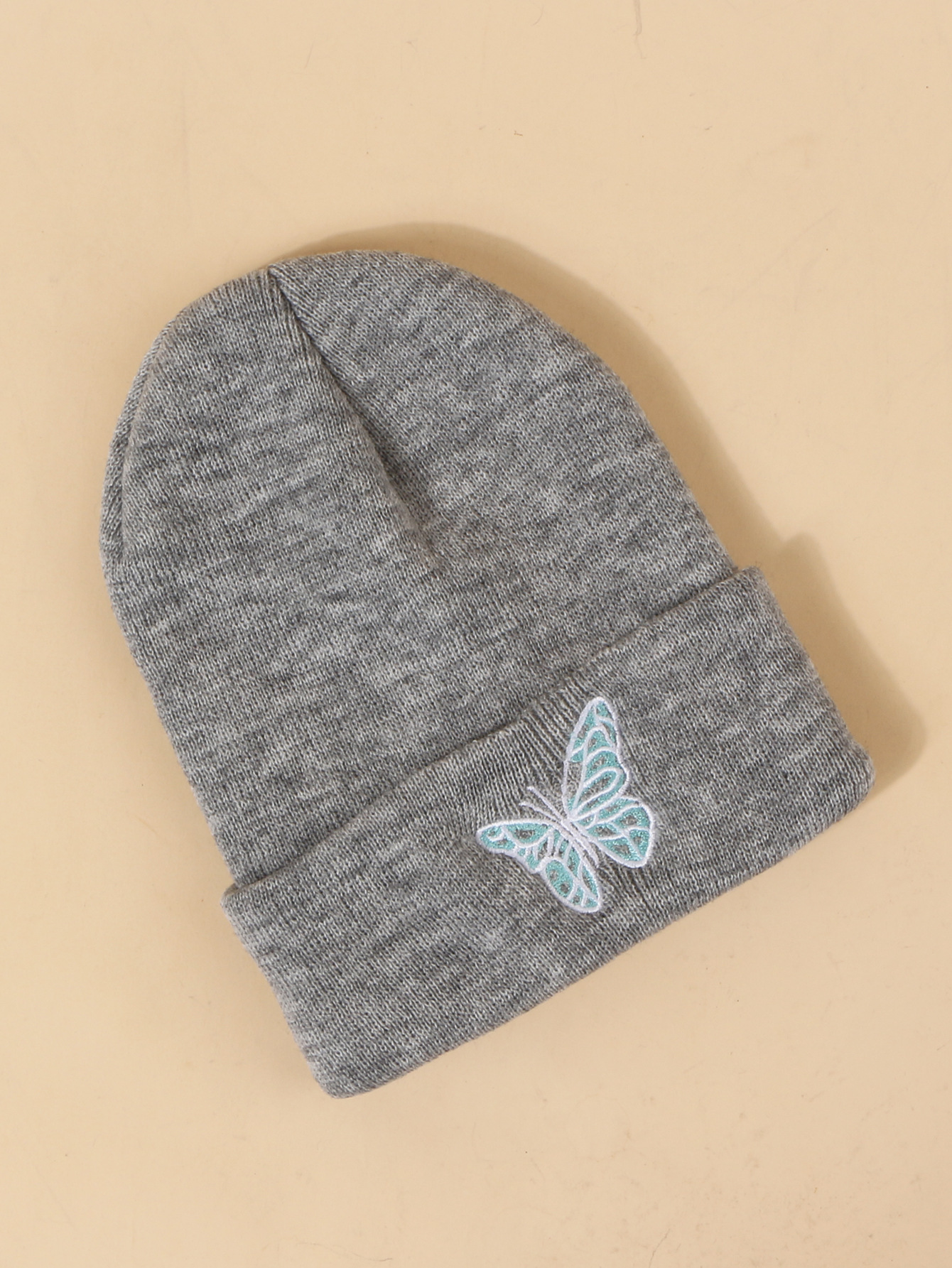 Hot Selling Fashion Pure Color Knitted Embroidery Butterfly Warm Woolen Hat Wholesale display picture 11