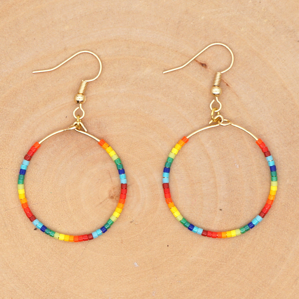 Fashion Exaggerated Rice Bead Woven Large Hoop Earrings display picture 11