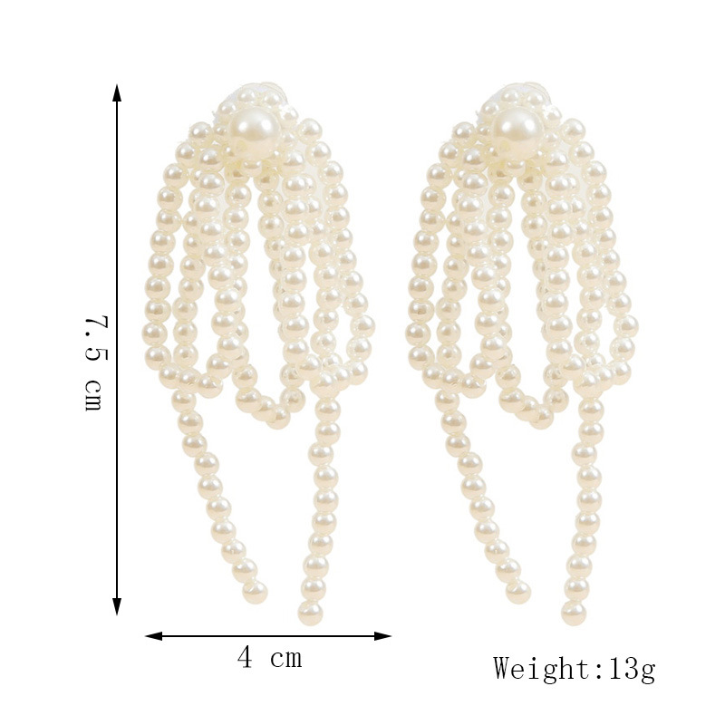 Korean Temperament Hand-woven Pearl Tassel Earrings Personality Long Earrings Jewelry Wholesale Nihaojewelry display picture 1