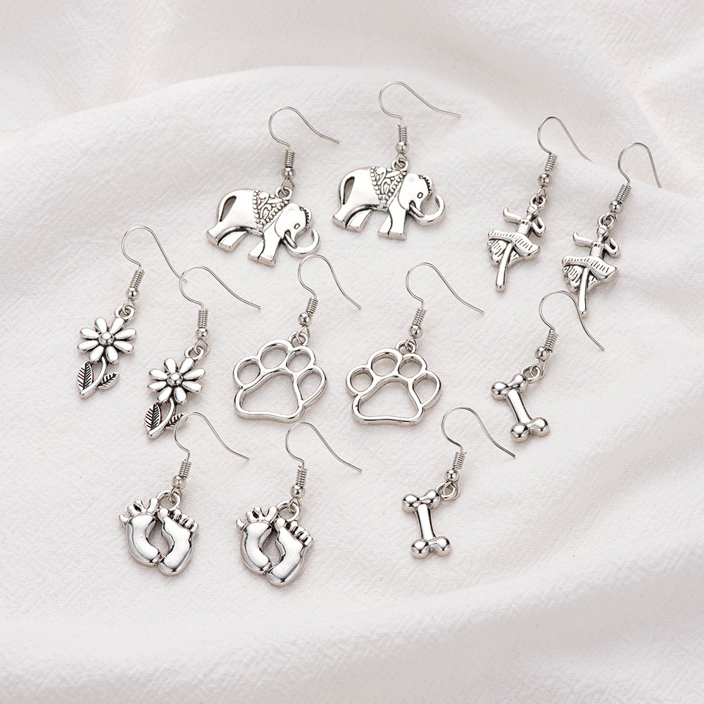 New Retro Alloy Footprint Ballet Bone Flower Earrings Wholesale display picture 2