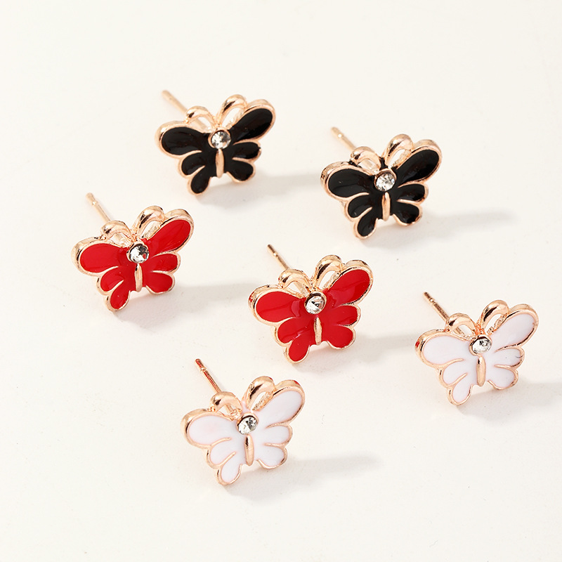 Korean Oil Drop Cartoon Butterfly Cute Pearl All-match Earrings Wholesale display picture 1