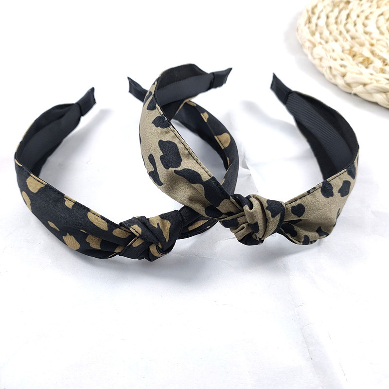 Korean Fashion New Fine-edged Exquisite Leopard Knotted Headband High-end Bowknot Pressure Headband Simple Hair Accessories Ladies Wholesale Nihaojewelry display picture 2