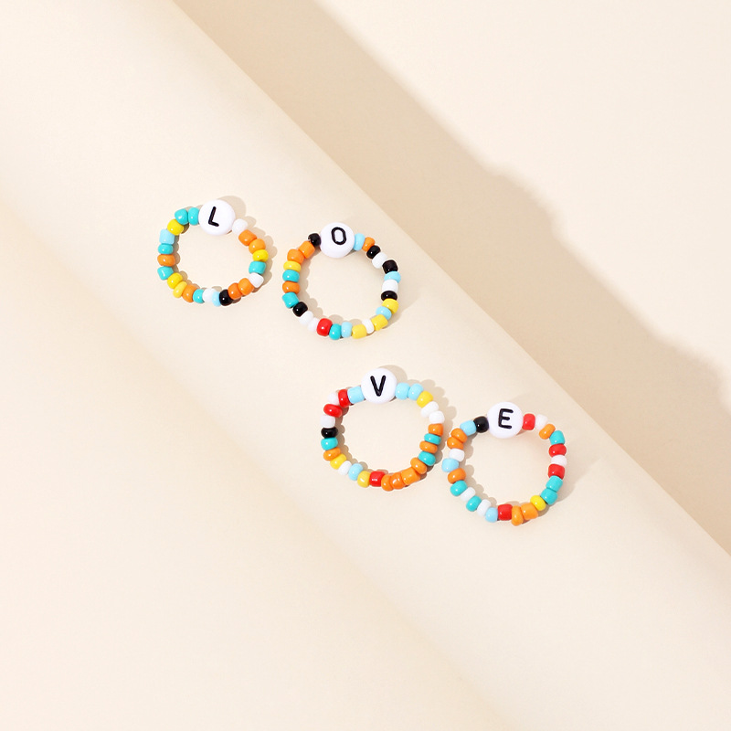 7g Weight Beaded Material Letter Pattern Women'S Gender Simple Style Style Hot Sale New Simple Color Rice Beads Love Ring Letter 4 Sets Of Ring Wholesale Nihaojewelry 4