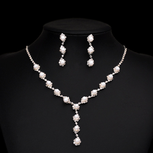 Cross-border new product launch: Pearl necklace set with sparkling rhinestone long earrings—versatile European and American-style bridal wedding accessories.